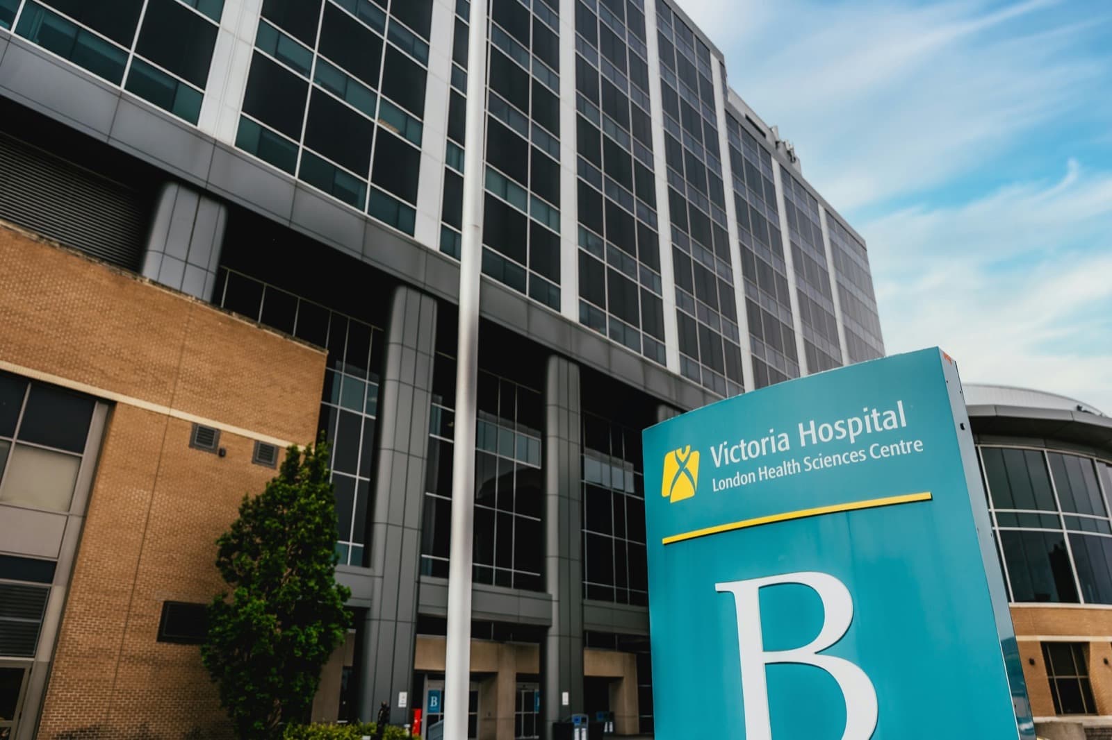 Hospital entrance with security officer on duty