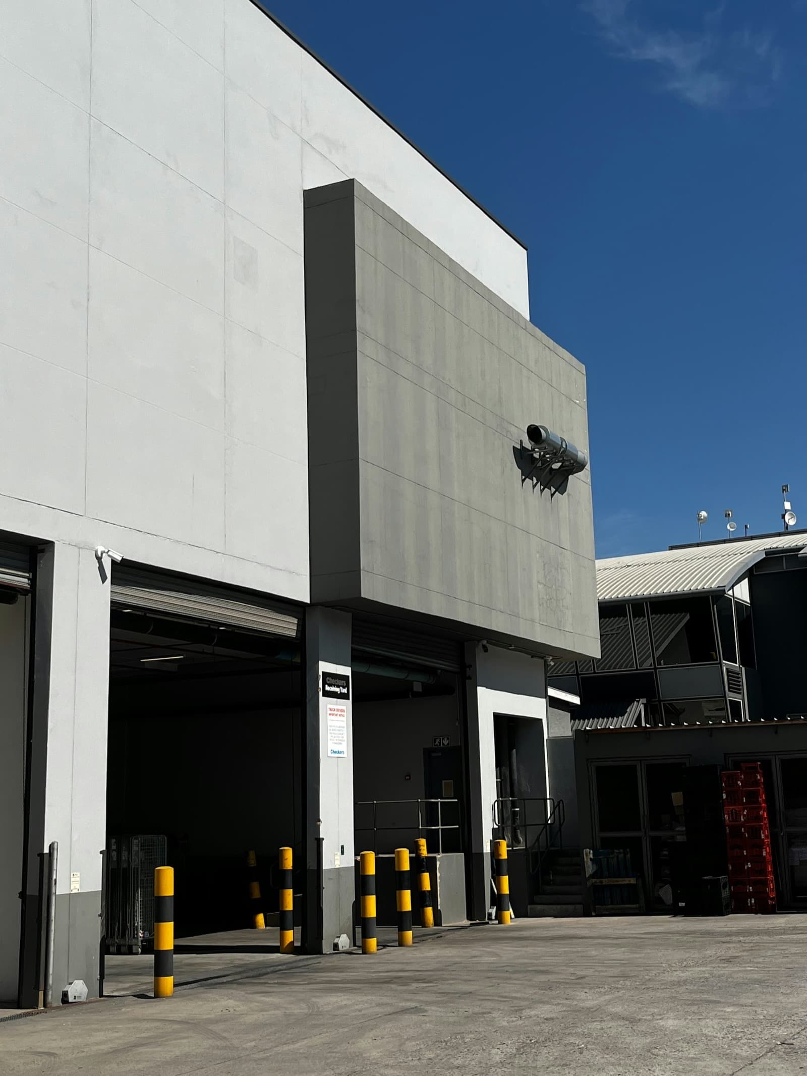 Security officer patrolling an industrial warehouse